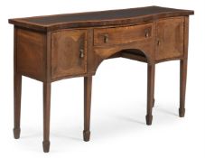 Y A GEORGE III MAHOGANY AND SATINWOOD BANDED SERPENTINE FRONTED SIDEBOARD, CIRCA 1790