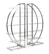 A CHROMIUM PLATED CIRCULAR TWO SECTION DISPLAY SHELF, CIRCA 1970