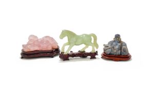 A CHINESE JADE HORSE, 20TH CENTURY, TOGETHER WITH TWO FURTHER CARVED FIGURES