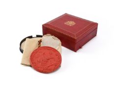 A GEORGE V RED MOROCCO LEATHER BOX WITH APPOINTMENT DOCUMENTS AND SEAL, 1911