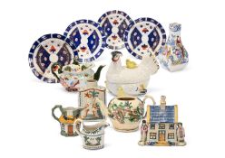 A PEARLWARE MONEYBOX MODEL OF A COTTAGE, YORKSHIRE, CIRCA 1830, TOGETHER WITH TWELVE FURTHER ITEMS
