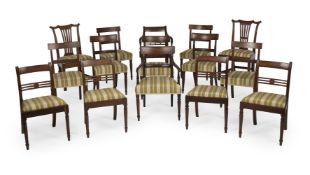 A HARLEQUIN SET OF THIRTEEN GEORGE IV MAHOGANY DINING CHAIRS, CIRCA 1825, AND TWO OTHER EXAMPLES