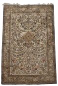 AN IVORY GROUND SILK ON SILK QUM RUG, 20TH CENTURY