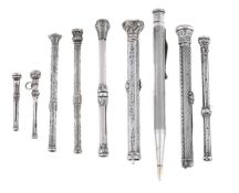 NINE SILVER PROPELLING PENCILS
