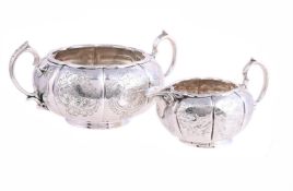 A VICTORIAN MATCHED SILVER LOBED CIRCULAR SUGAR BOWL AND MILK JUG