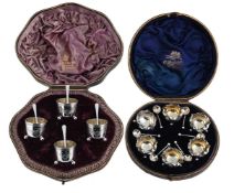 TWO CASED SETS OF VICTORIAN SILVER SALTS