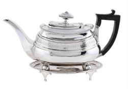 A GEORGE III SILVER OBLONG BALUSTER TEA POT AND A GEORGE III OVAL TEA POT STAND