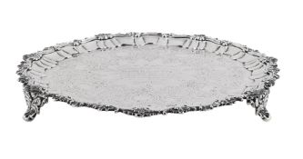 A VICTORIAN IRISH SILVER SHAPED CIRCULAR SALVER