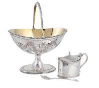 A VICTORIAN SILVER SWING HANDLED SUGAR BASIN AND AN OVAL MUSTARD