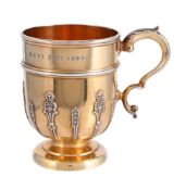 A CASED VICTORIAN SILVER GILT MUG