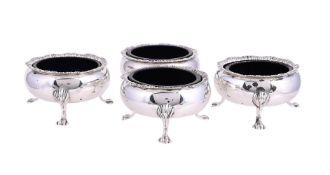 A SET OF FOUR VICTORIAN SILVER CAULDRON SALTS