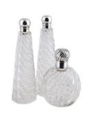 THREE VICTORIAN SILVER MOUNTED SCENT BOTTLES
