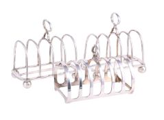 THREE SILVER TOAST RACKS