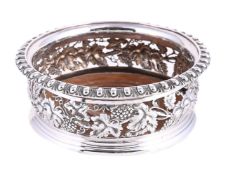 A GEORGIAN SILVER WINE COASTER