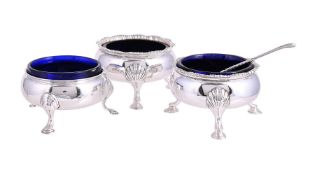 A PAIR OF GEORGE III SILVER CAULDRON SALTS AND ANOTHER