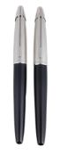 WATERMAN, EDSONE, TWO METALLIC BLACK LACQUER ROLLERBALLS