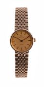 GARRARD, A LADY'S 9 CARAT GOLD BRACELET WATCH