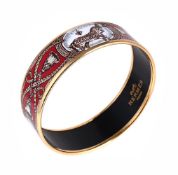 HERMÈS, GRAND APARAT, A BROAD PRINTED ENAMEL BANGLE