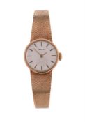 TISSOT, REF. 1061, A LADY'S 9 CARAT GOLD BRACELET WATCH