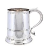A GEORGE II SILVER BEER MUG