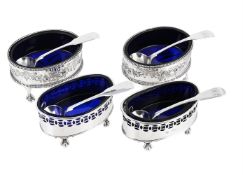 TWO PAIRS OF SILVER OVAL SALTS