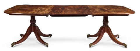 A REGENCY MAHOGANY TWIN PEDESTAL DINING TABLE, EARLY 19TH CENTURY