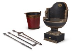 A BASKET SHAPED CAST IRON FIRE GRATE, MODERN