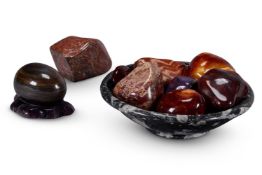 A GROUP OF PREDOMINANTLY RED POLISHED SPECIMEN HARDSTONE SECTIONS