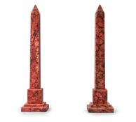 A PAIR OF PAINTED SIMULATED RED MARBLE OBELISKS, MODERN