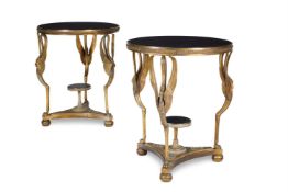 A PAIR OF BRASS AND BLACK MARBLE GUERIDONS OF FRENCH EMPIRE STYLE