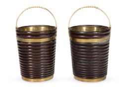 Y A PAIR OF MAHOGANY AND BRASS-BOUND PEAT BUCKETS IN GEORGE III IRISH STYLE, MODERN