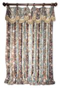 A PAIR OF FLORAL PATTERNED CURTAINS WITH FRINGED PELMET IN THE SAME FABRIC BY OSBORNE AND LITTLE