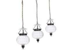 A SET OF THREE MELON SHAPED GLASS HANGING LIGHTS, 20TH CENTURY