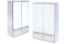 A PAIR OF GERMAN STAINLESS STEEL MEDICINE CABINETS, BY METALKRIS