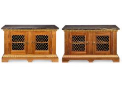 A PAIR OF CHERRYWOOD AND PARCEL GILT SIDE CABINETS OF GEORGE II STYLE