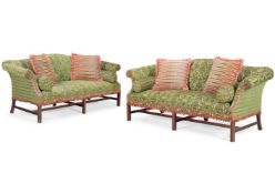 Y A PAIR OF MAHOGANY HUMP-BACKED SOFAS, MODERN