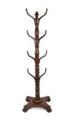 A WILLIAM IV MAHOGANY HATSTAND CIRCA 1830, IN THE MANNER OF GILLOWS
