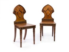 A PAIR OF GEORGE IV OAK GOTHIC HALL CHAIRS, CIRCA 1820