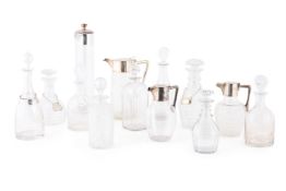 AN ASSORTMENT OF MOSTLY DECANTERS, VARIOUS DATES MOSTLY 20TH CENTURY