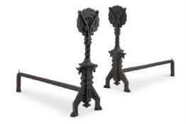 A PAIR OF AESTHETIC MOVEMENT CAST IRON FIRE DOGS, CIRCA 1890
