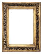 A GILTWOOD AND BLACK PAINTED MIRROR, PROBABLY ITALIAN