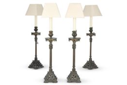 A SET OF FOUR BRONZE CANDLESTICK LAMP BASES, LATE 19TH CENTURY