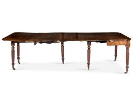 A REGENCY MAHOGANY CONCENTINA ACTION EXTENDING DINING TABLE, CIRCA 1825