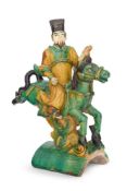 A 'SANCAI' GLAZED EQUESTRIAN RIDGE TILE CHINESE, MING DYNASTY