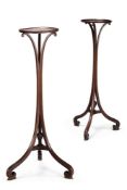 A PAIR OF EARLY GEORGE III MAHOGANY TORCHERES, 18TH CENTURY