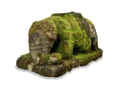 A CARVED STONE RECUMBENT ELEPHANT, 20TH CENTURY
