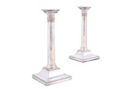 A PAIR OF OLD SHEFFIELD SILVER PLATE CANDLESTICKS