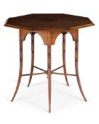AN OCTAGONAL 'SIX-LEGGED' CENTRE TABLE BY E. W. GODWIN (ENGLISH 1833-1886), CIRCA 1880