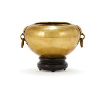 A Chinese brass censer with loose ring handles