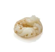 A Chinese carved white jade 'Dragon' pendant